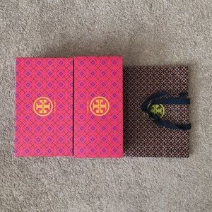 Bundle of Tory Burch boxes and shopping bag